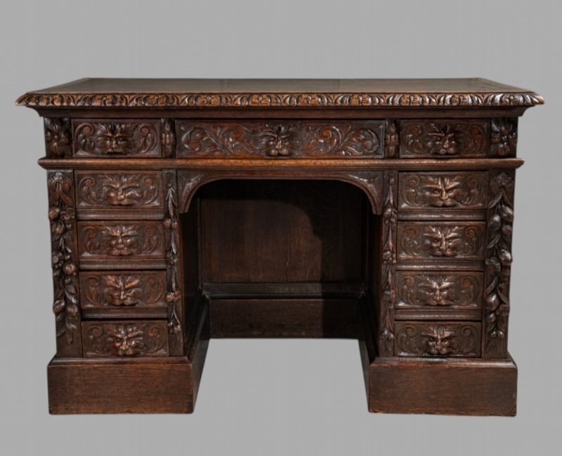 A Late C19th Solid Carved Oak Green Man Kneehole Desk, c. 1890